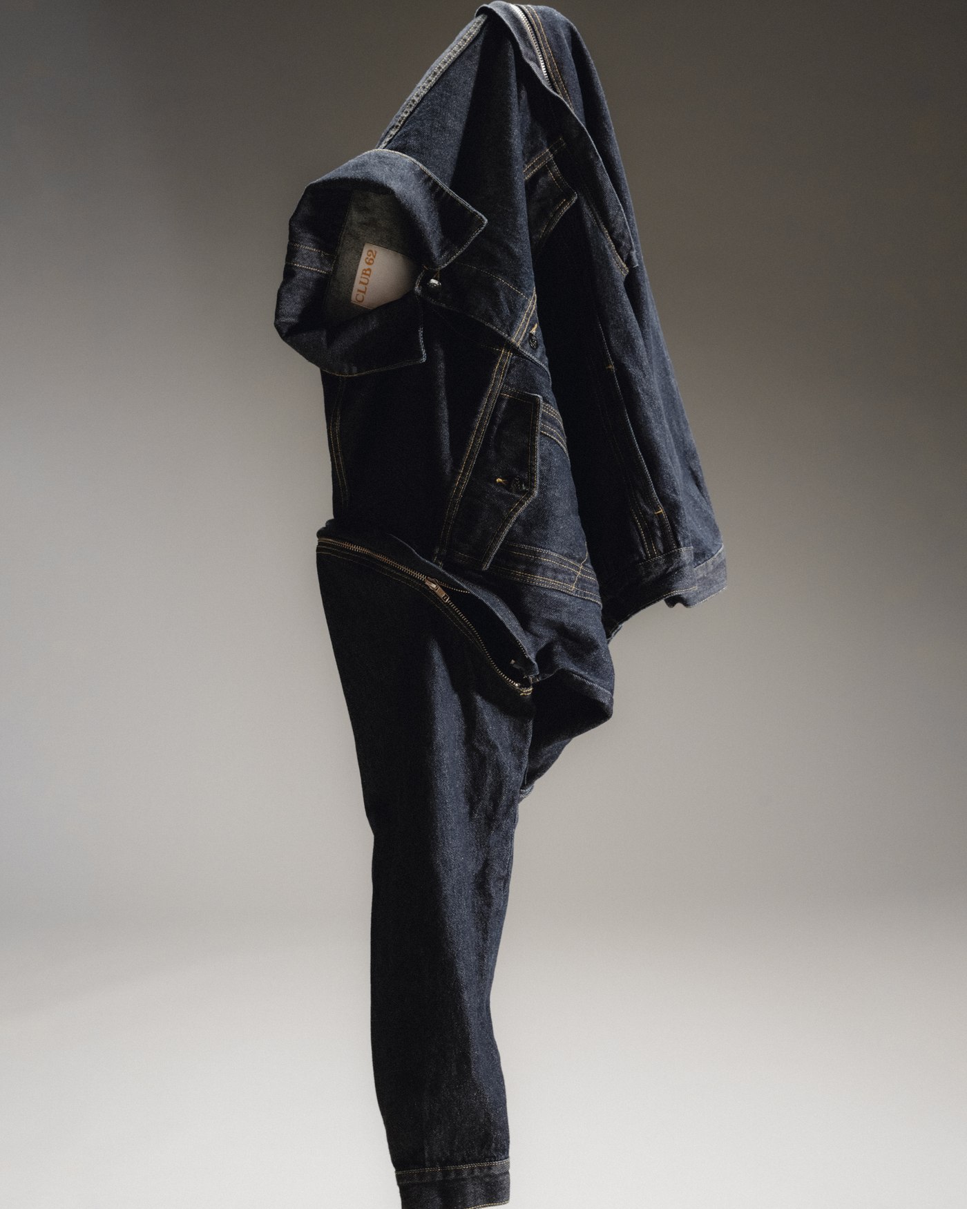 lookbook extension — dark jacket, still shoot